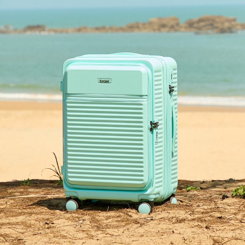 GEEK suitcase in a beach travel scene